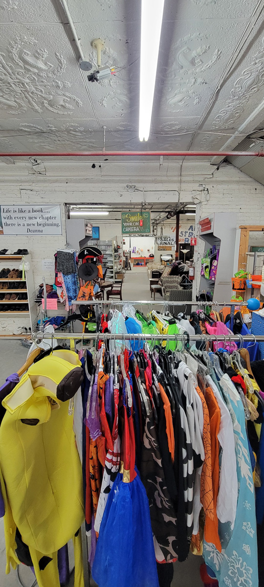 Colourful clothing hanging on a rack in the store