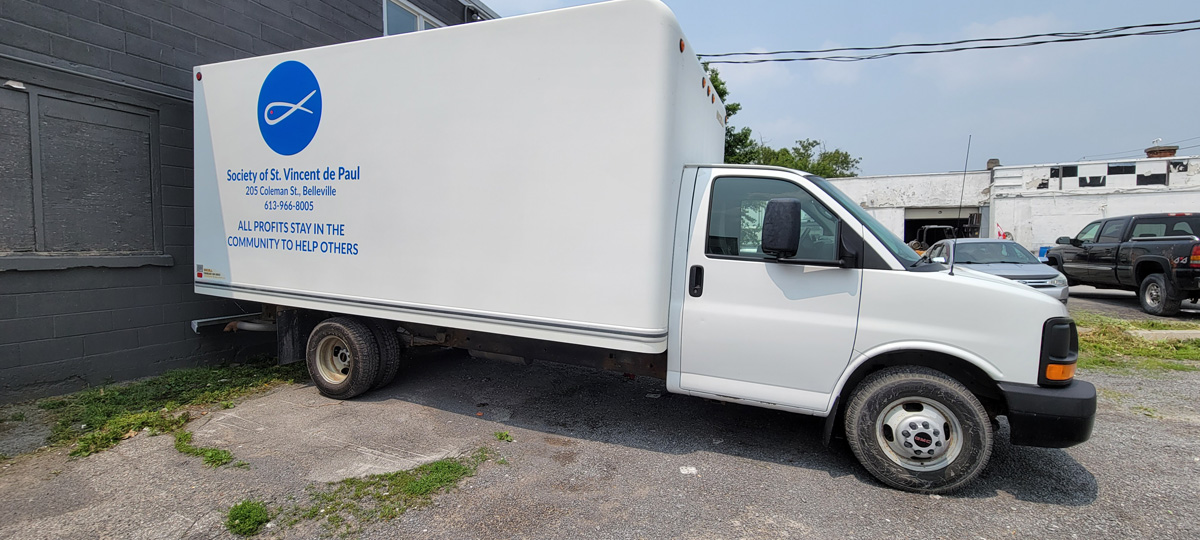 Delivery truck beside the donation bay